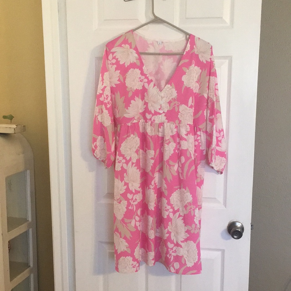 Large synthetic silky dress in beautiful deep pink with off white flower print.